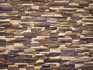 Brown brick wall. Brick wall as background