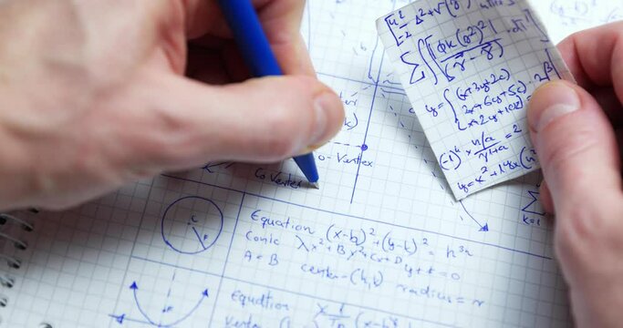 Math handwriting in notebook closeup