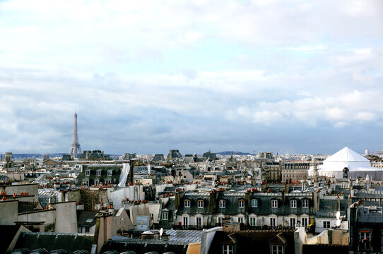 Beautiful Paris rooftops with distant view of Eiffel Tower