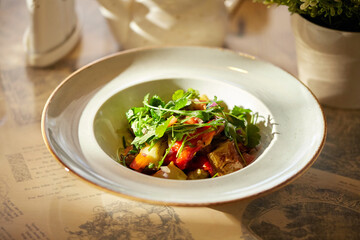 Assorted warm salads, lunch at a restaurant