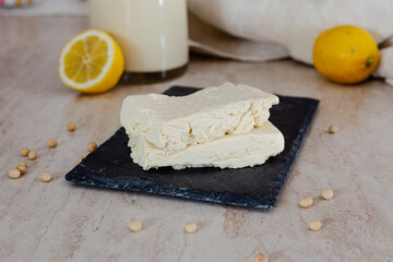 Homemade tofu. Vegan cheese from soybeans
