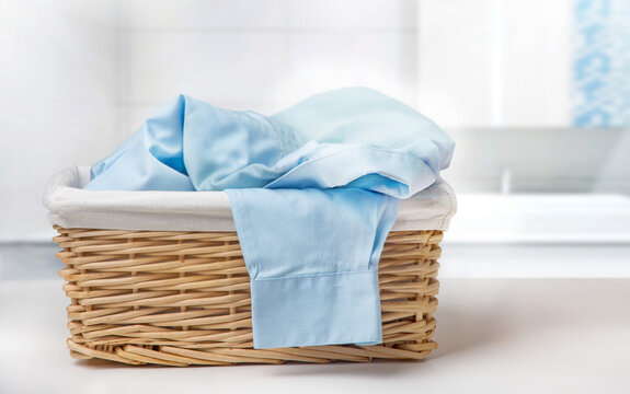 Basket With Laundry On The Table