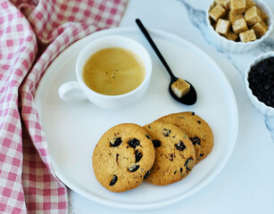 biscuits with chocolate espresso cup with napkin