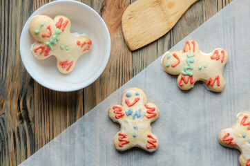 gingerbread gingerbread men on a wooden table.