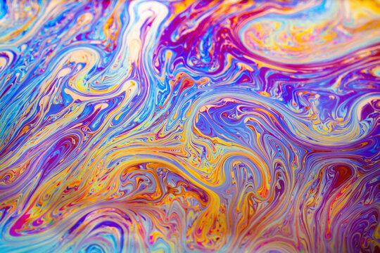 Macro picture of soap bubble psychedelic color background
