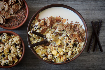 Healthy breakfast muesli with seeds and yogurt in a bowl. Keto breakfast. Diet food.