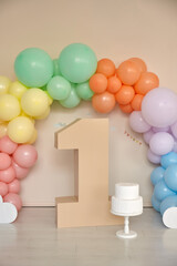 Obraz na płótnie Canvas first birthday decorations baloons digit one interior