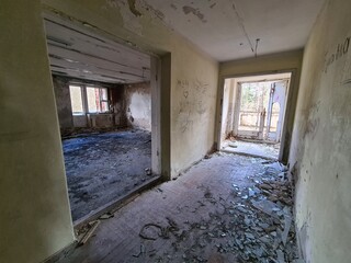 Ruins of an abandoned house. Devastation. War. Consequences of an accident at a nuclear power plant. Ecological catastrophy.