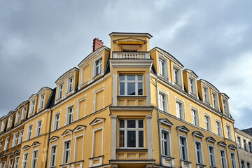 facade of a historic tenement house - obrazy, fototapety, plakaty