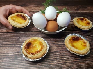 Picking belem cake in close-up with traditional decoration