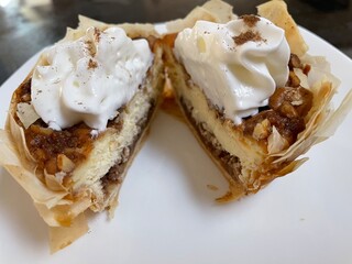 Cheesecake baklava individual serving with whipped cream