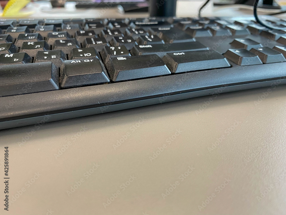Poster black office computer plastic keyboard with buttons for typing text in the office