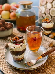 Homemade trifle with cream cheese, chocolate, jelly and berries.