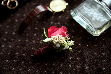 different accessories of a businessman for creating a style of a people lie on a wooden background