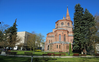 Fototapeta na wymiar The church in the park - The Church of Holy Apostles - Bydgoszcz, Poland