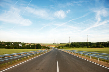country road through hilly german landscape