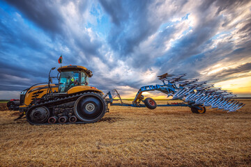Tractor plowing the fields