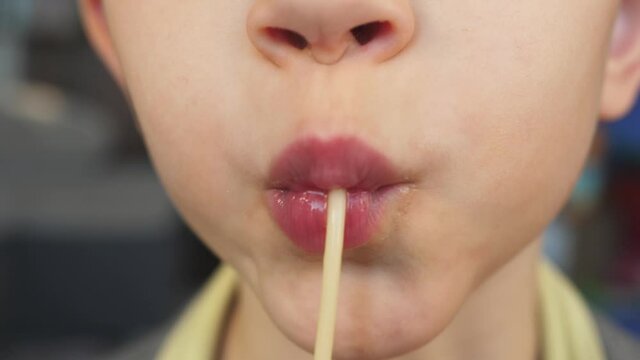 macro close up lips mouth sucking spaghetti string