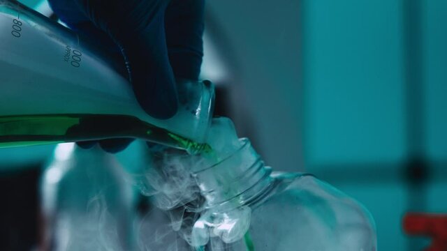 Chemical laboratory experiment with liquid. Smoke or steam in the laboratory
