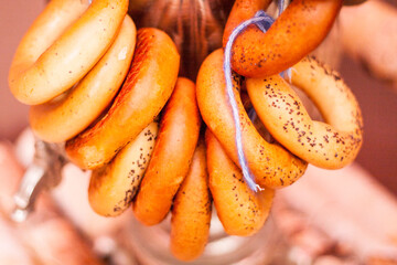 a bunch of delicious bagels with poppy swwds closeup