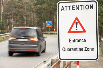 A road sign warns of the entrance to the quarantine zone.