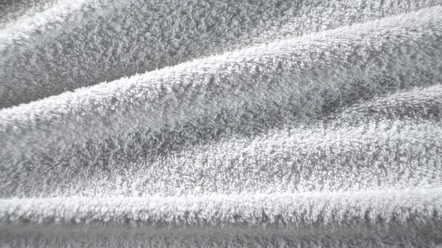 The texture of the fabric. white knitted texture. Close-up. Can be used as a background. HD
