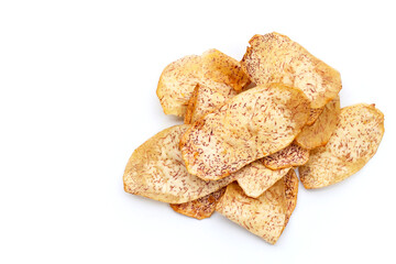 Crispy taro chips on white background.