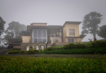 Fototapeta na wymiar country house with mist