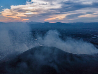 mountain in the smoke of a fire