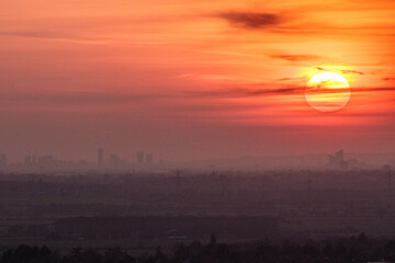 Sunset behind the city.