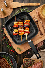 Grilled vegetables in a frying pan in a rustic kitchen. High quality photo