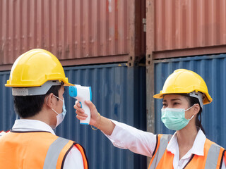 Businessman manager forman engineer staff company factory office container wear mask white temperature measurement protection covid-19 corona virus disease logistic shipping asian international
