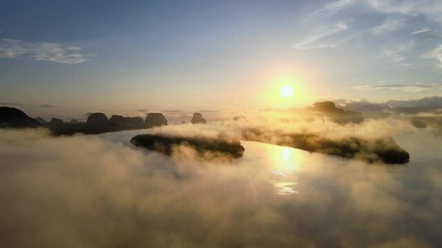 Aerial view in perspective of drone. View of sunset or sunrise. Over river and misty cloud in river. Mountain and sky sunset or sunrise background. Nature and travel concept.