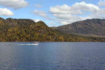 The NorthSilver PRO 745 Cabin boat of the transport police is patrolling the waters of Lake Teletskoye. Altai Republic