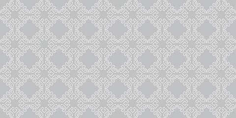 Ethnic background pattern on a silver background. Seamless wallpaper texture for your design. Vector image