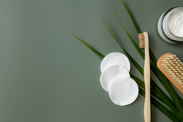 Bath accessories flat lay on green background. Plastic free environment concept