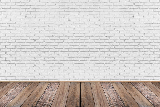 Empty living room with wooden floor and white painted brick wall background. For design interior.