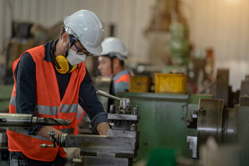 Technician wear disposable face mask for protection corona virus working in factory,Job,Heavy...