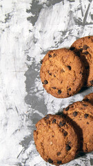 Cookies with chocolate icing, on a white and black background, copy space, template