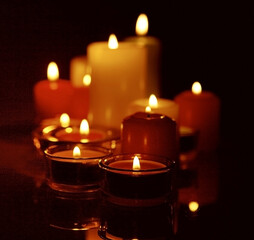 burning candles in the dark