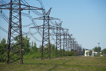 Pavlodar, Kazakhstan - 05.29.2015 : High-voltage power lines with transformers, insulators, and...
