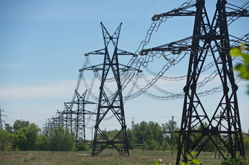 Pavlodar, Kazakhstan - 05.29.2015 : High-voltage power lines with transformers, insulators, and wires.