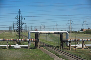 Pavlodar, Kazakhstan - 05.29.2015 : High-voltage power lines with transformers, insulators, and...