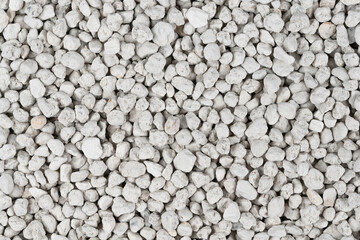 White pebbles background texture. Rock background. clay pebbles