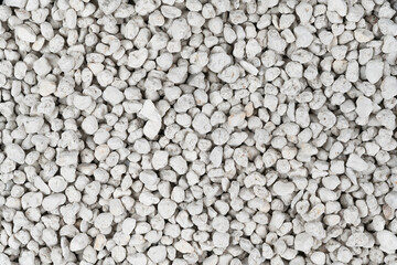 White pebbles background texture. Rock background. clay pebbles
