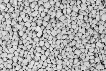 White pebbles background texture. Rock background. clay pebbles