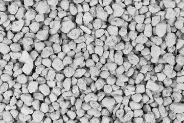 White pebbles background texture. Rock background. clay pebbles