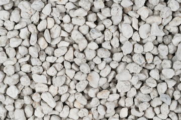 White pebbles background texture. Rock background. clay pebbles