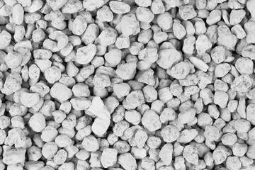 White pebbles background texture. Rock background. clay pebbles