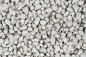White pebbles background texture. Rock background. clay pebbles